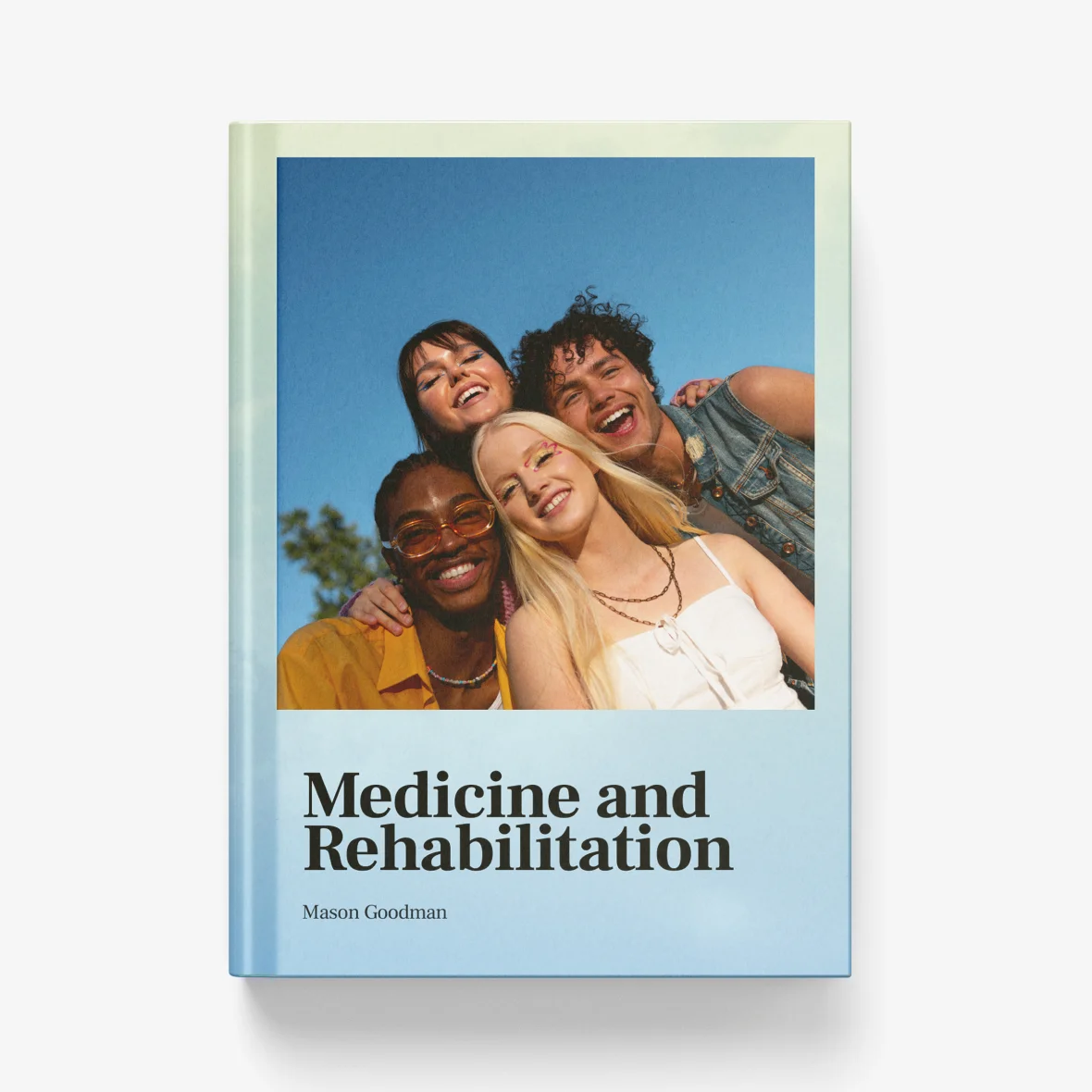 Group of four smiling friends posing together outdoors on a sunny day, with a blue sky background.