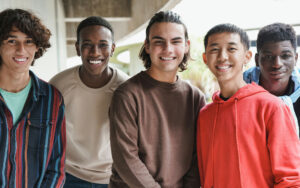 group of teens smiling summer activity